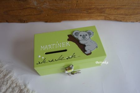 Pokladnička se zámečkem