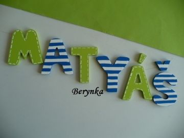 Dřevěná písmenka "s čárkováním"